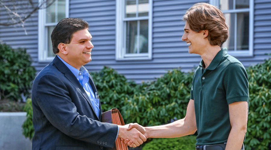 Shaking hands after a successful real estate closing.